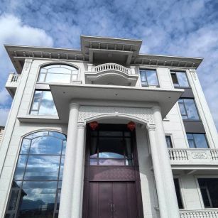 盘锦白麻别墅外墙干挂石材效果示例