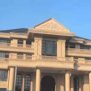 盘锦黄金麻别墅外墙干挂石材效果示例