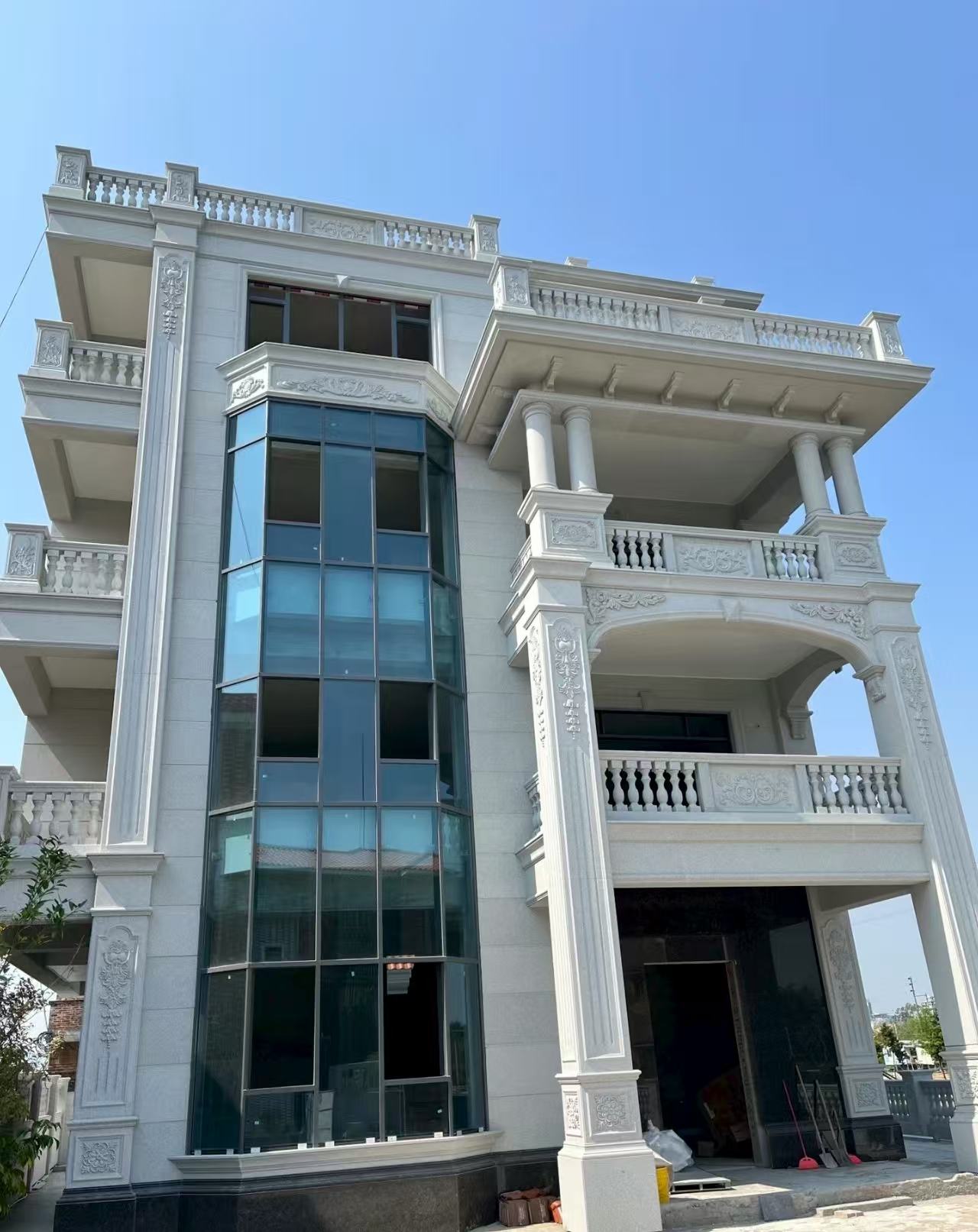 盘锦 白麻花岗岩别墅外墙干挂效果展示