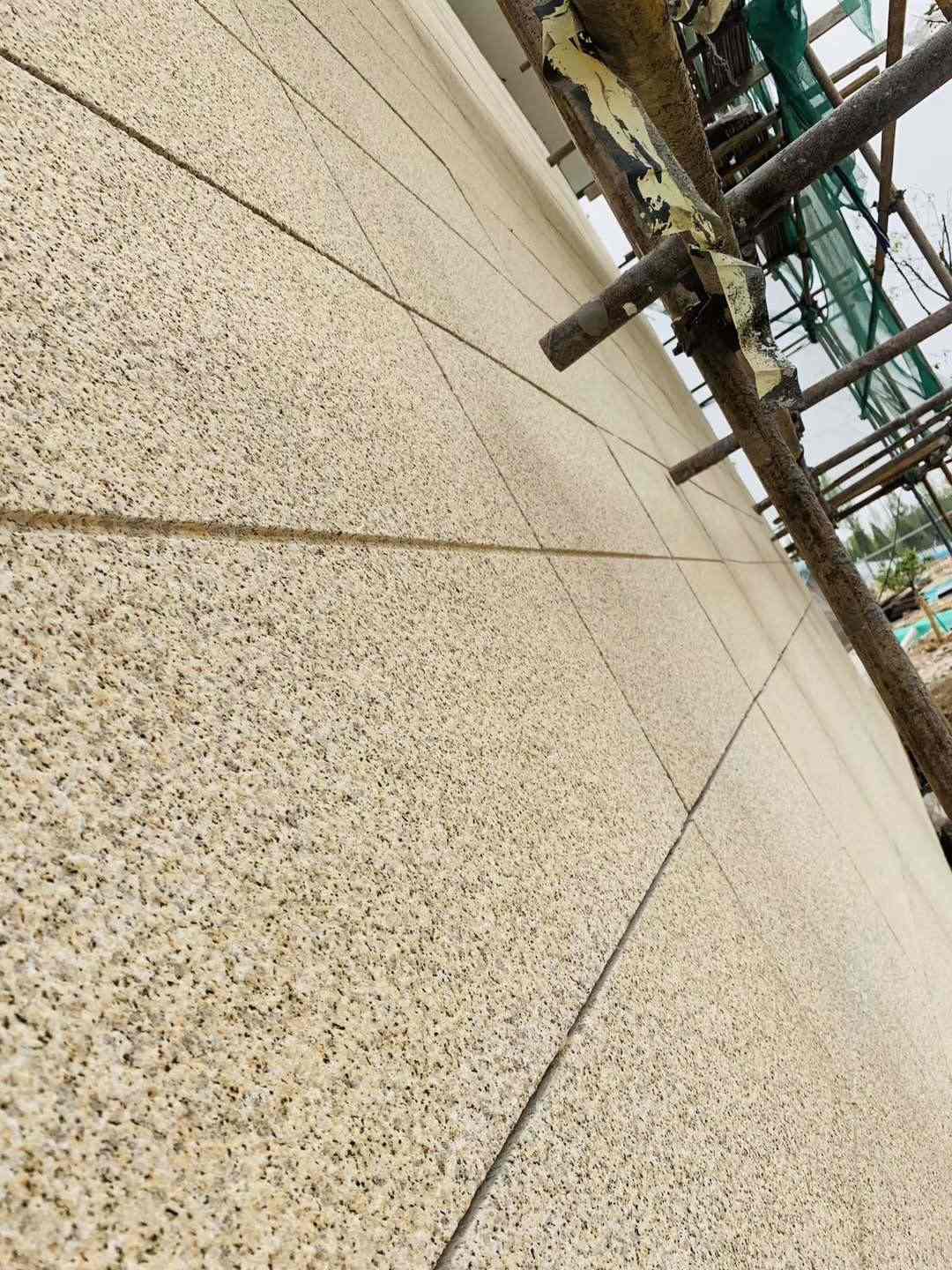 盘锦 黄金麻花岗岩荔枝面外墙干挂石材效果示例