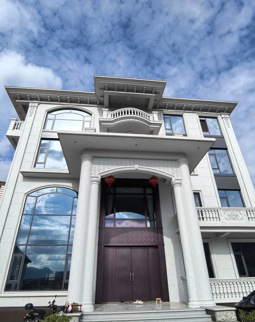 盘锦白麻别墅外墙干挂石材效果示例